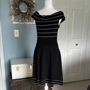 Ted Baker-Elegant Black and White Striped Dress . It is a size 3/ 10-12